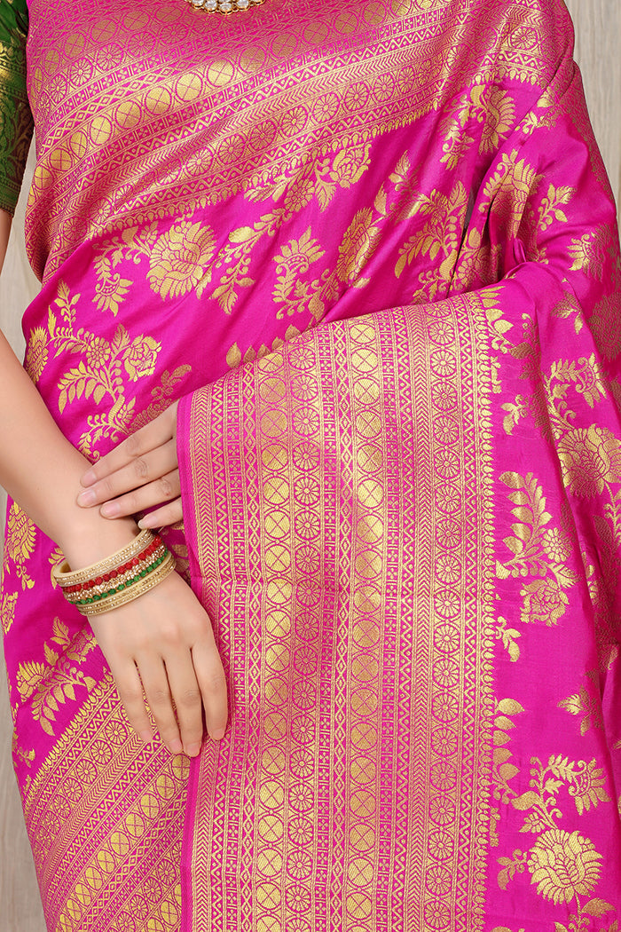 Pink Banarasi Silk Saree with Rich Golden Zari and Contrast Green Blouse