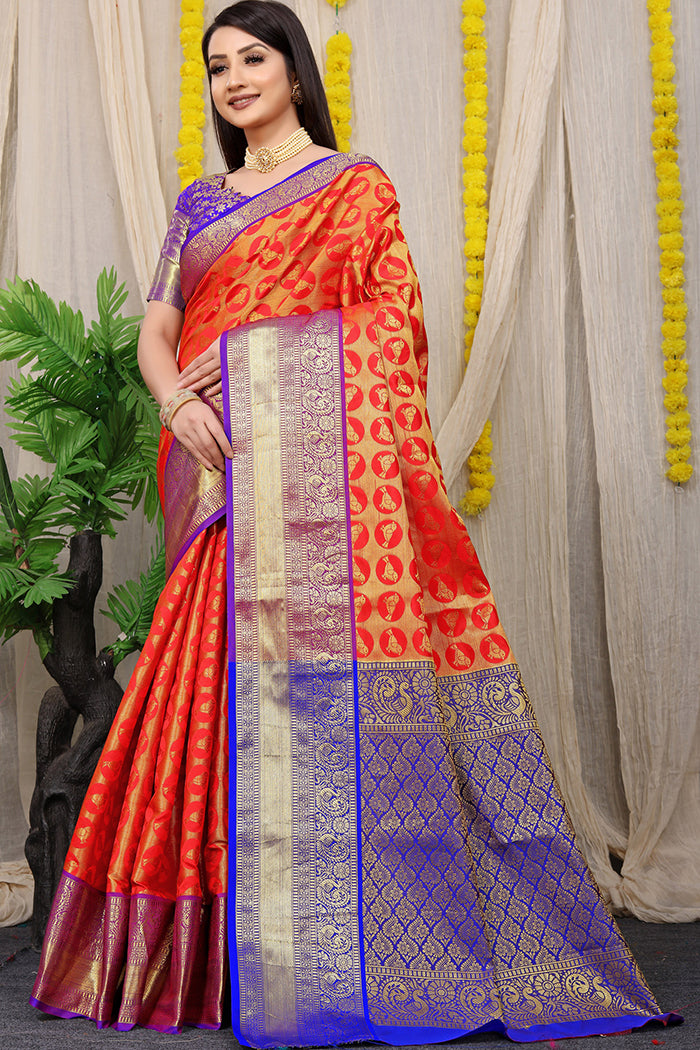 Radiant Red-Orange kanjeevaram Silk Saree with Royal Blue Zari Border