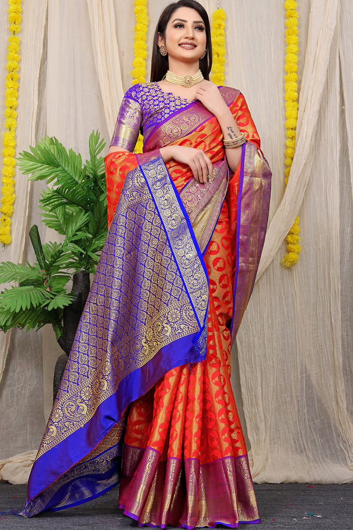 Radiant Red-Orange kanjeevaram Silk Saree with Royal Blue Zari Border