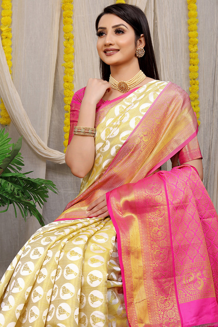 Elegant White kanjeevaram Silk Saree with Gold Zari Work & Contrast Pink Border
