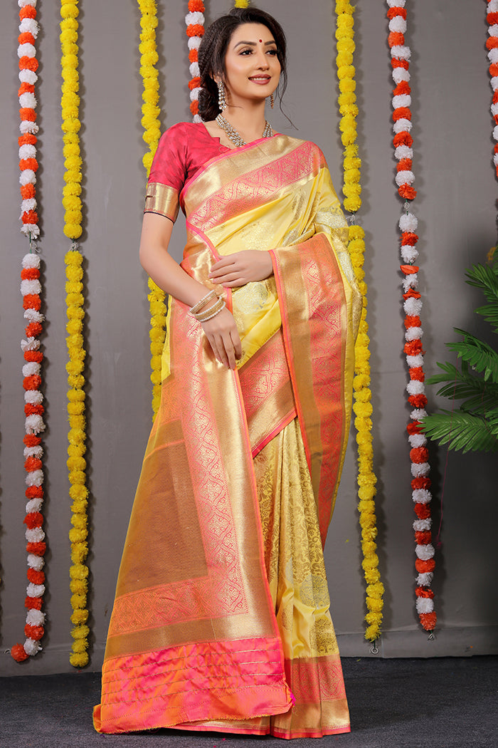 Yellow Banarasi Silk Saree with Gold Zari Work and Pink Border