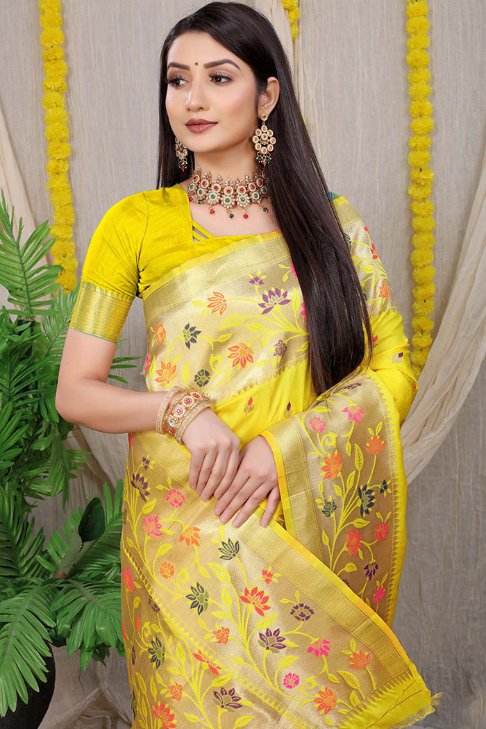 Radiant Yellow Banarasi Silk Saree with Floral Zari Weaving