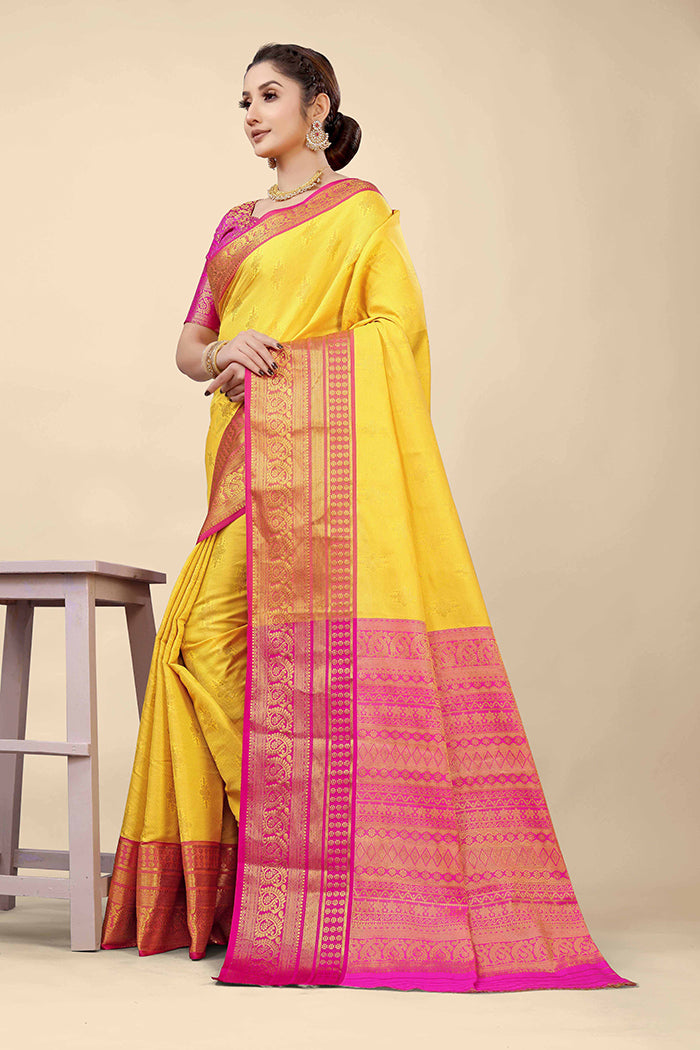 Radiant Yellow Banarasi Silk Saree with Magenta Pink Zari Border and Golden Motifs