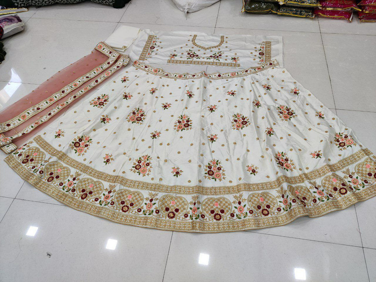 White Partywear Embroidered Work Lehenga Choli