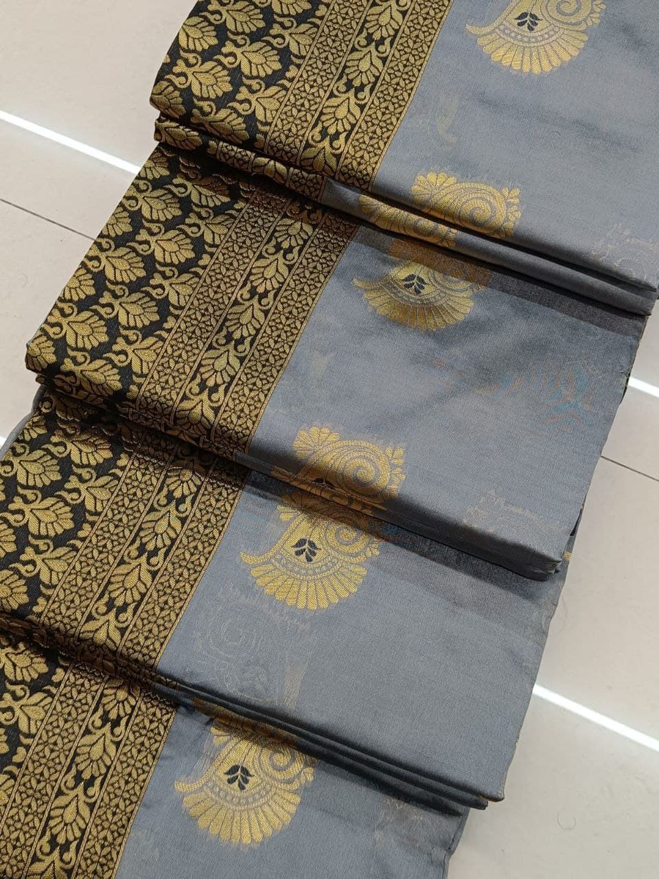 grey sari with black zari work