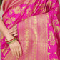 Pink Banarasi Silk Saree with Rich Golden Zari and Contrast Green Blouse