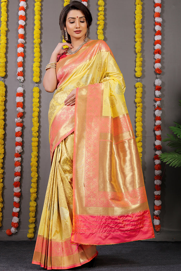 Yellow Banarasi Silk Saree with Gold Zari Work and Pink Border