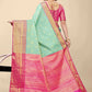 Mint Green Banarasi Silk Saree with Magenta Pink Zari Border and Golden Motifs