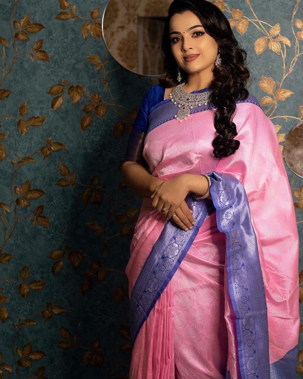 Pink saree deals with blue blouse