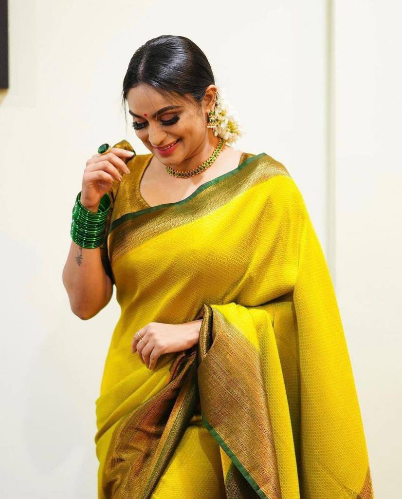  Kanjivaram Yellow Green Heavy Border saree for social occasisonn