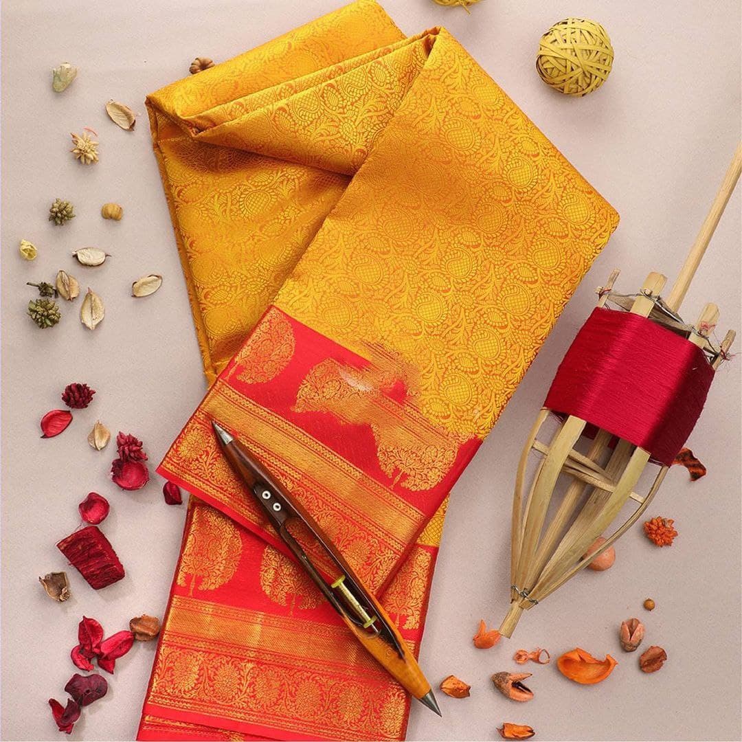 Yellow and Red Kanjivaram saree for wedding