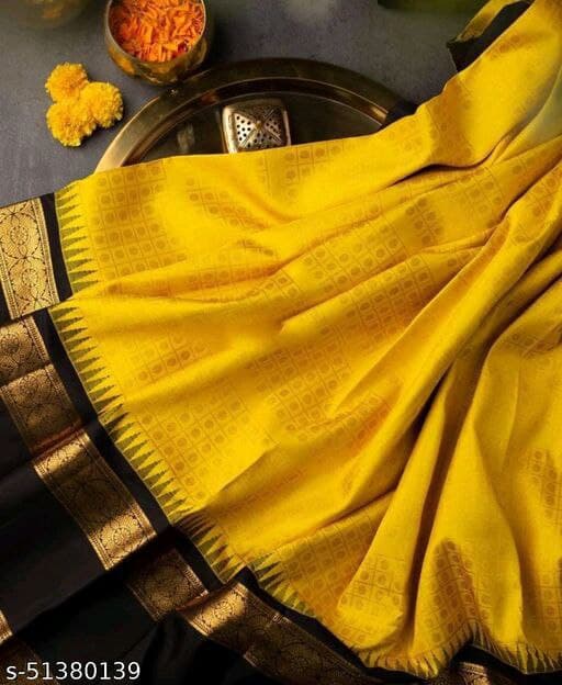 Yellow Handwoven Kanchipuram Silk Saree With Rudraksham Motifs On Contrast Black  Border And Pallu